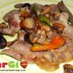 maiale con friarelli funghi e olive