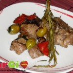 Coniglio con funghi e olive