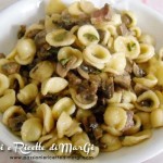 Pasta con funghi e zucchine con pancetta