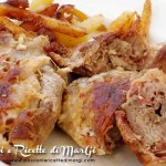 Involtini di maiale con speck e salsiccia