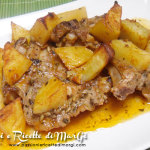 Costolette di agnello al forno con patate speziateCostolette di agnello al forno con patate speziate